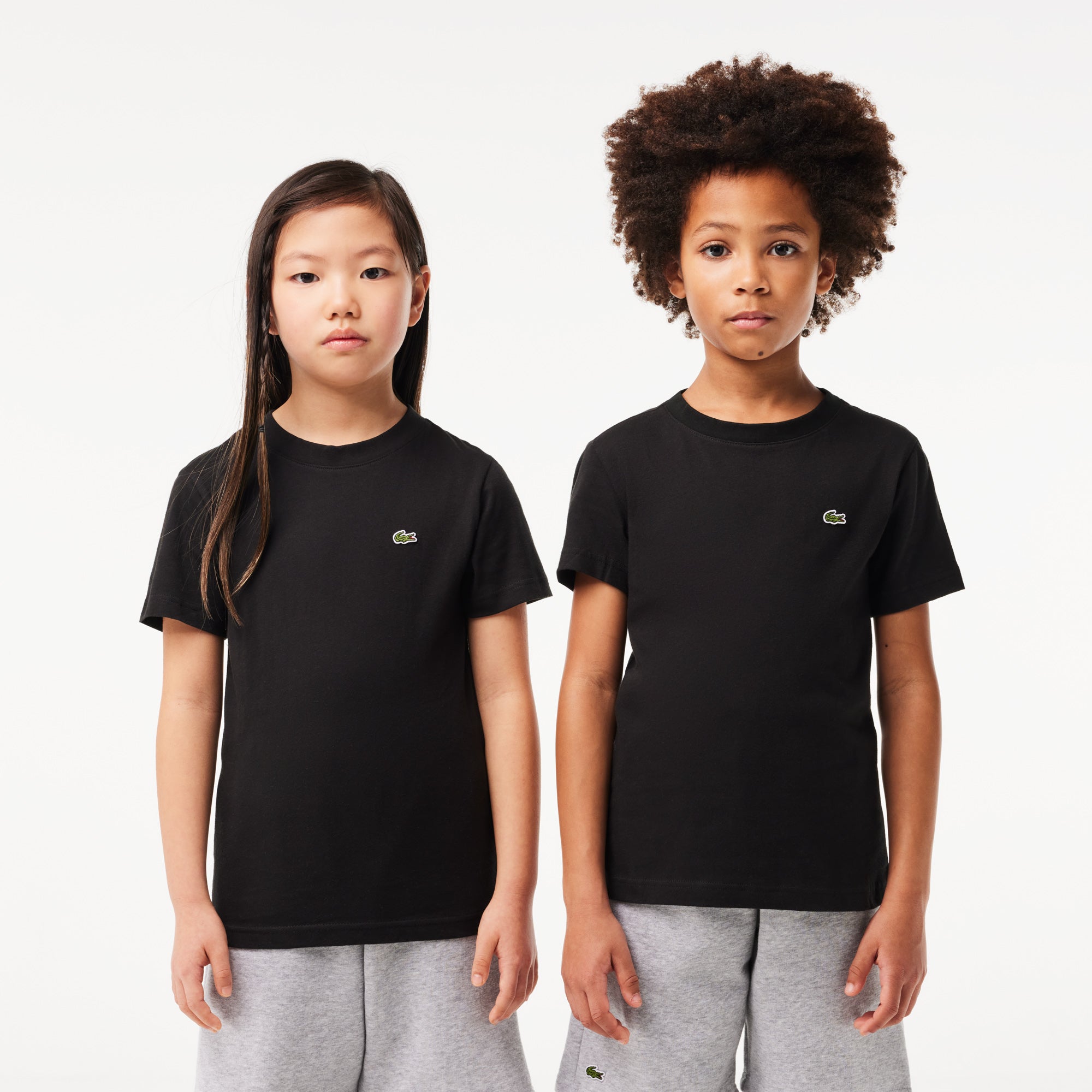 Lacoste plain black t shirt best sale